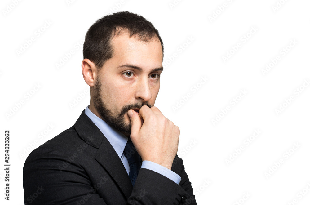 Young businessman in a thoughtful expression Young businessman in a thoughtful expression