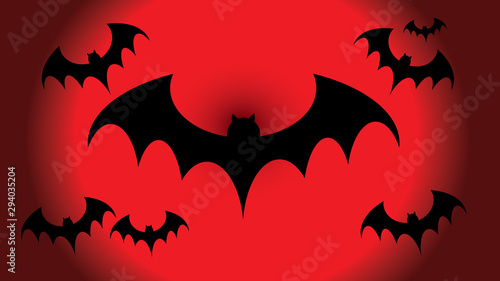 Flying bblack bat silhouettes, halloween decoration photo