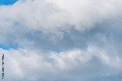 Nature background of tall cumulus clouds  blue sky and white clouds