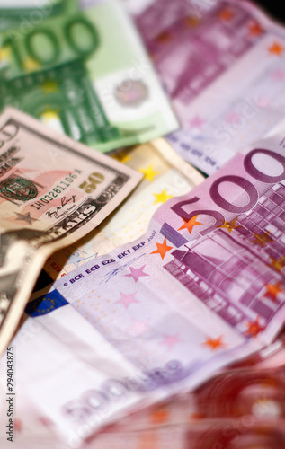 Dollar and Euro. Finance and Economy.   Five hundred Euro and Fifty Dollars photo