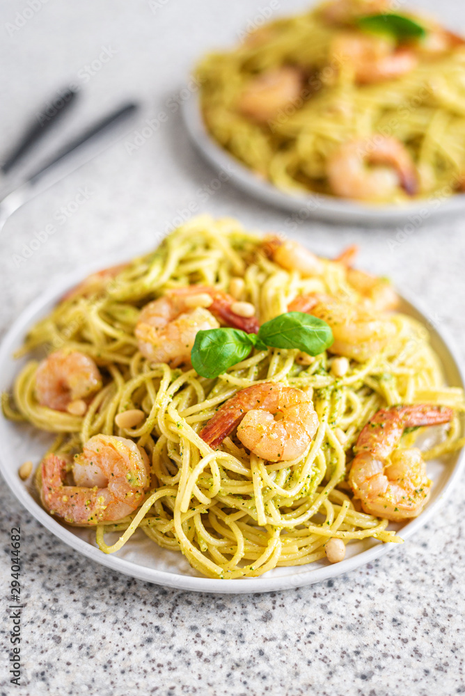 Spaghetti seafood pasta with prawns and basil. Pasta with pesto and prawns. Spaghetti seafood pasta with prawns and basil. Pasta with pesto and prawns.
