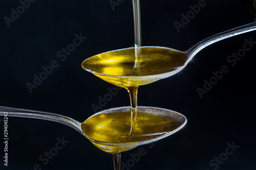 olive oil flowed in small spoons