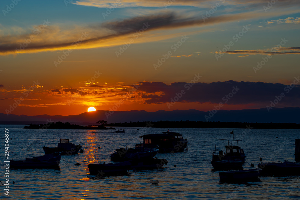 Beautiful sunset view and vivid colors in Waterfront Ildiri, Cesme, Izmir - TURKEY Beautiful sunset view and vivid colors in Waterfront Ildiri, Cesme, Izmir - TURKEY