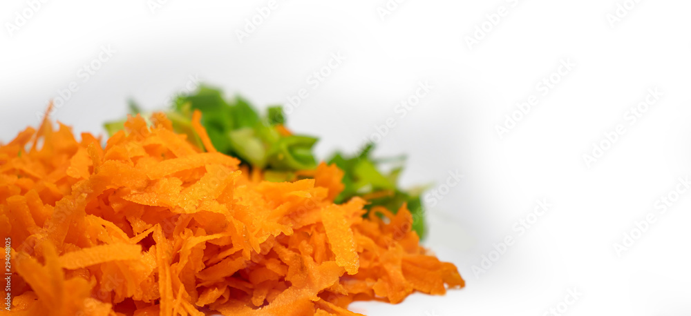 Sliced carrot and leeks on white background. Fresh sliced vegetables Sliced carrot and leeks on white background. Fresh sliced vegetables