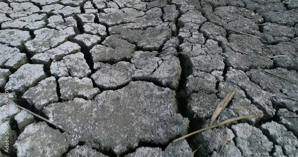 Dry lake bed with natural texture of cracked clay in perspective floor Dry lake bed with natural texture of cracked clay in perspective floor