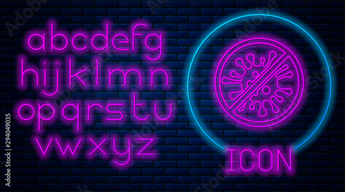 Glowing neon Stop virus, bacteria, germs and microbe icon isolated on brick wall background. Antibacterial and antiviral defence, protection infection. Neon light alphabet. Vector Illustration