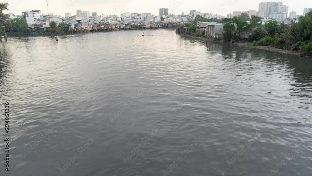 The river with small boat in Vietnam .Saigon city The river with small boat in Vietnam .Saigon city