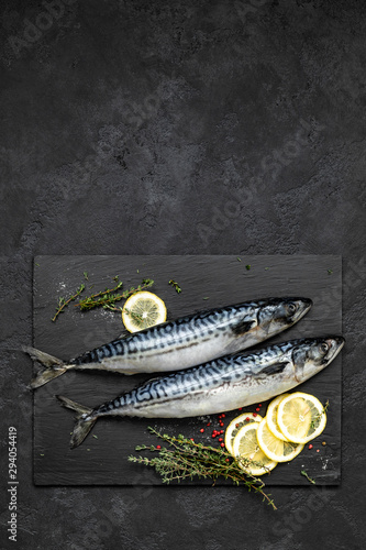 Mackerel. Fresh raw fish with ingredients for cooking, top view, flat lay