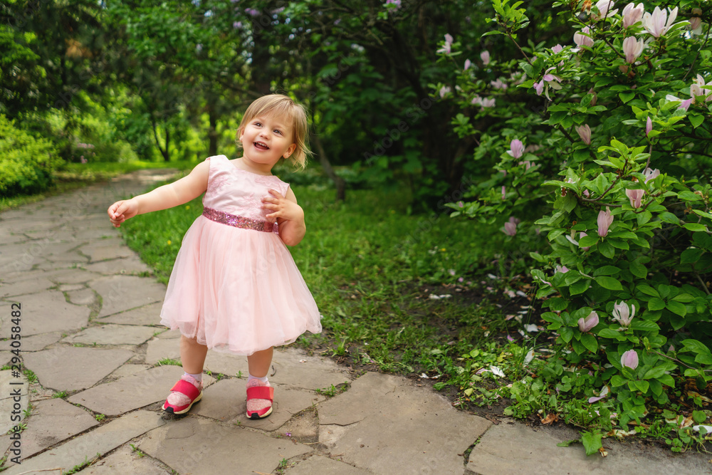Smiling kid in summer park. Smiling kid in summer park.