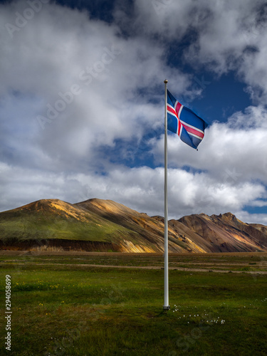 Obraz na płótnie Icelandic flag against the backdrop of the Landmannalaugar mountains w salonie