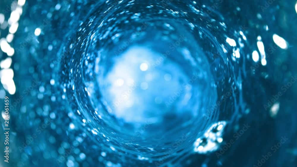 Super slow motion of pouring water in twister shape. Filmed on high speed cinema camera, 1000 fps.