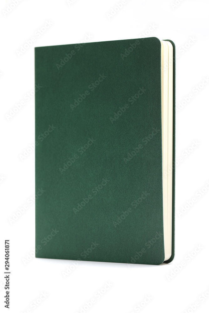 Green diary isolated on white background. Business education concept. Office supplies. Green diary isolated on white background. Business education concept. Office supplies.