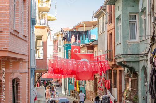 Narrow streets with low colorful houses. Mediterranean style. Middle Eastern flavor. Historical concept. Hipster background. Facades of buildings decorated in boho style. Turkey, Istanbul