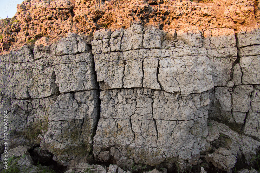 The curb erosion from storms. To indicate the layers of soil and rock. The curb erosion from storms. To indicate the layers of soil and rock.