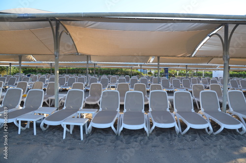 sunbeds on the beach are ready to receive vacationers