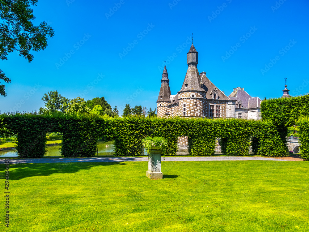Summer sunny view of Jehay Castle or Jehay-Bodegnee Castle in Province of Liege, Belgium