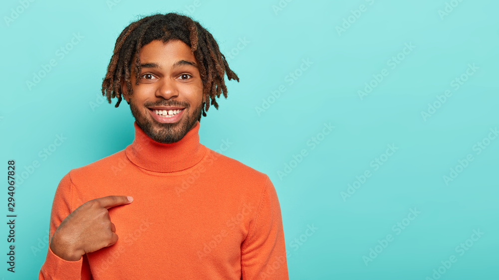 Positive mixed race man with dreads 