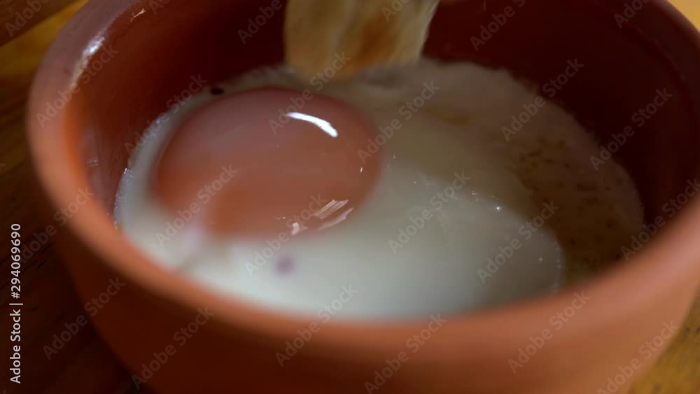 A man having breakfast (eggs with toast) and close up moving A man having breakfast (eggs with toast) and close up moving