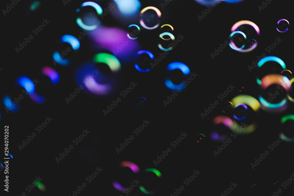 Colorful bubbles over dark background Colorful bubbles over dark background