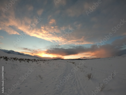 Cloudy Sunset of snowy valley bishop california