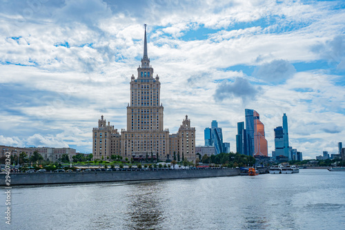 Moscow. Russia. Different architectural styles in the capital of the Russian Federation. High-rise building of Stalin times. Moskva-city. Modern complex of skyscrapers. Boat trips on the river Moscow.