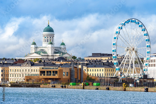 Helsinki. Finland. Harbour. Cruise port. Ferris wheel on the waterfront. The dome of the Church of St. Nicholas towers over the city. Sightseeing In Helsinki. Scandinavia.