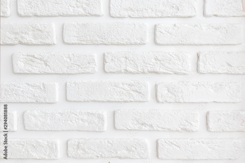 white wall with decorative brick elements