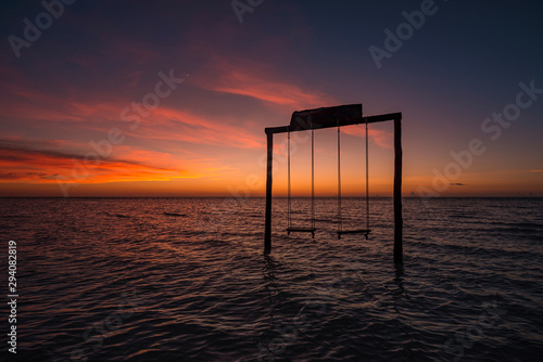 Amazing sunset at Holbox Island in the Caribbean Ocean of Mexico photo