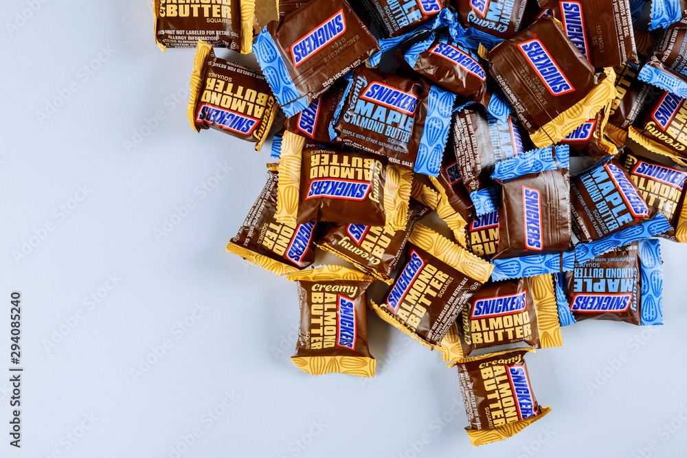 Snickers mini candy bars heap is a chocolate bar with maple almond butter  candy ang almond butter candy bar Stock Photo
