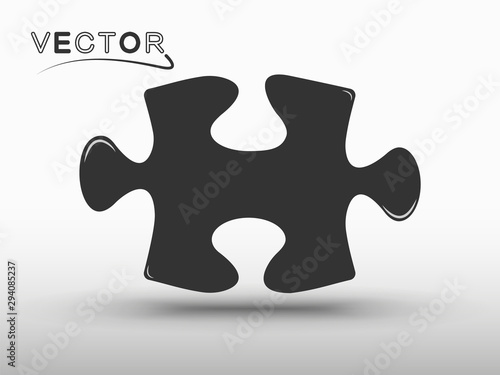 Puzzle icon silhouette, with shadow. Vector element on isolated light background.
