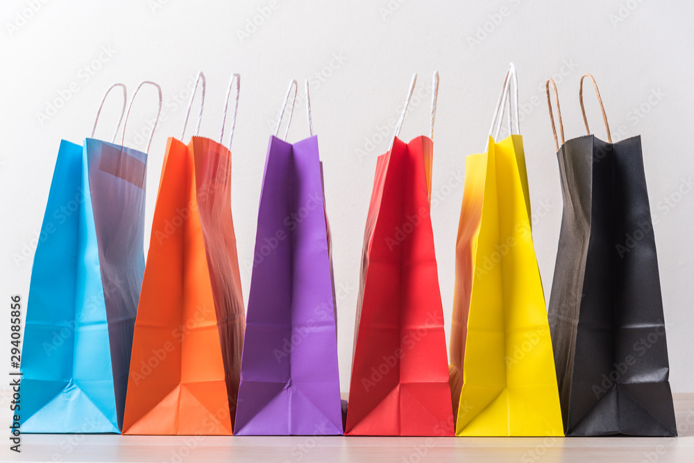 row of colourful shopping bag