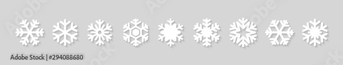 Set of snowflake icons with shadow. Vector Christmas decoration elements.