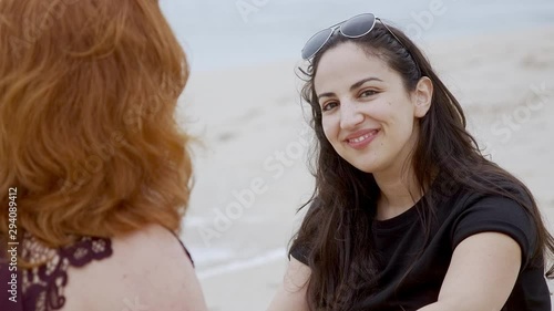 Relaxing at the beach while eating a water melon - slow motion shot