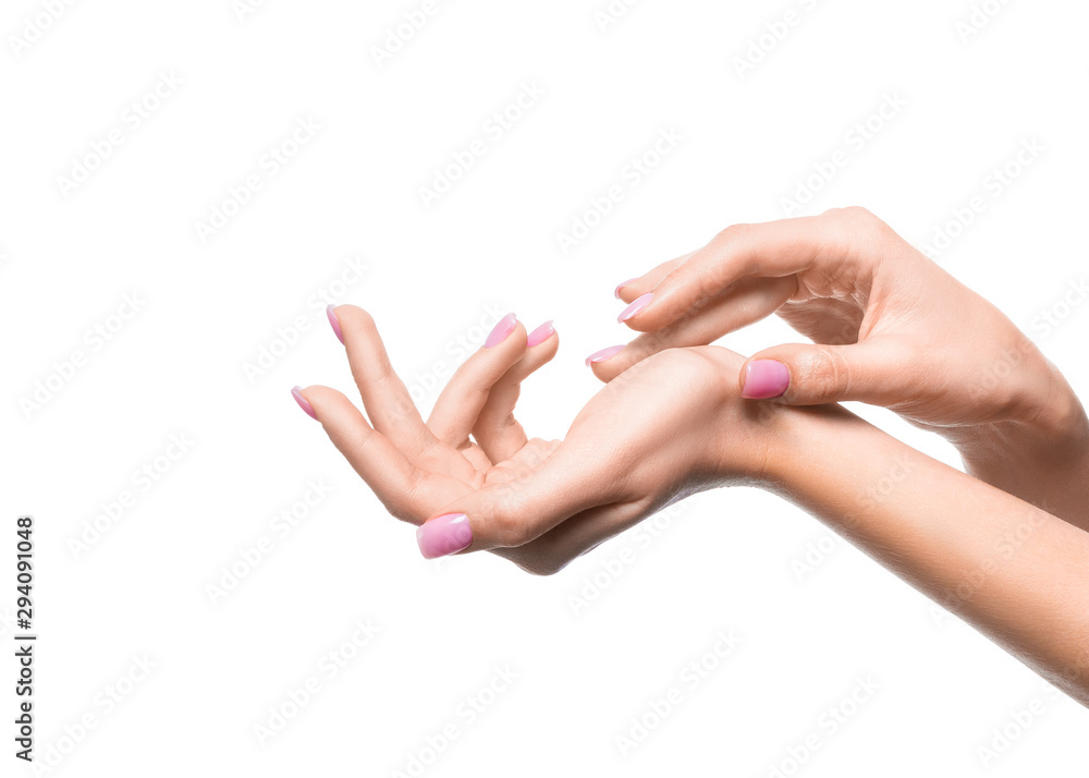 Female hands close up. Applying cream.