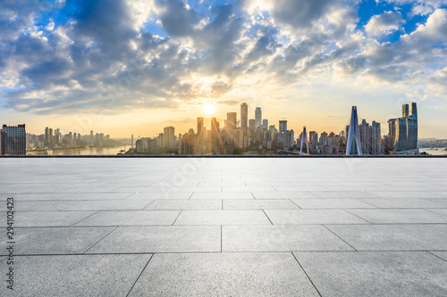 Empty square floor and modern city skyline in chongqing at sunset,China.