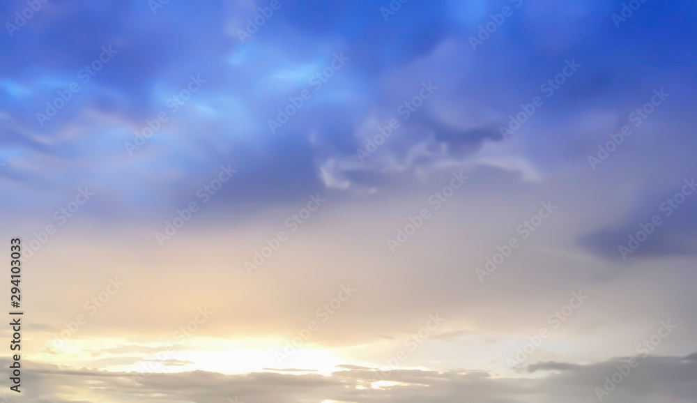 Dramatic atmosphere panorama view of tropical beautiful silhouette storm clouds on golden twilight sky background in summer.