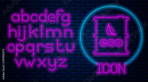 Glowing neon Bio fuel barrel icon isolated on brick wall background. Eco bio and canister. Green environment and recycle. Neon light alphabet. Vector Illustration