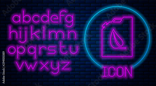 Glowing neon Bio fuel canister icon isolated on brick wall background. Eco bio and barrel. Green environment and recycle. Neon light alphabet. Vector Illustration