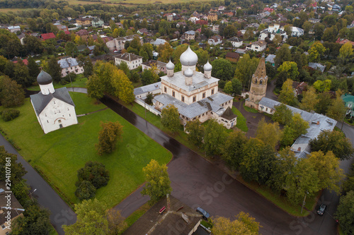 Znamensky Cathedral and Church of the Savior Transfiguration in the cityscape on a cloudy September day (aerial photography). Veliky Novgorod, Russia photo