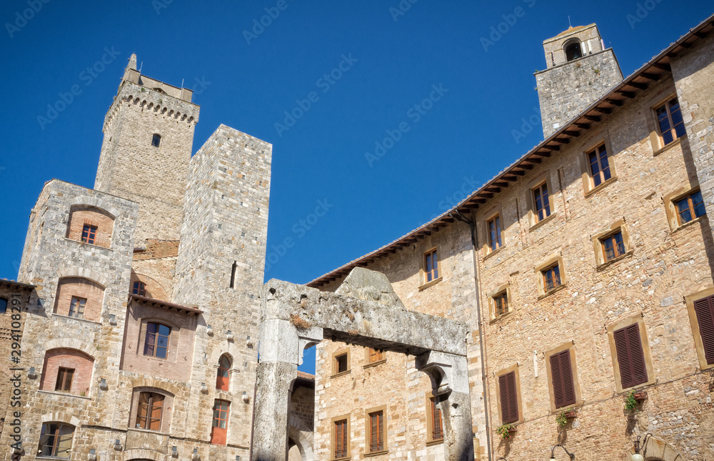 Square in the medieval town of San Gimignano - Tuscany Italy