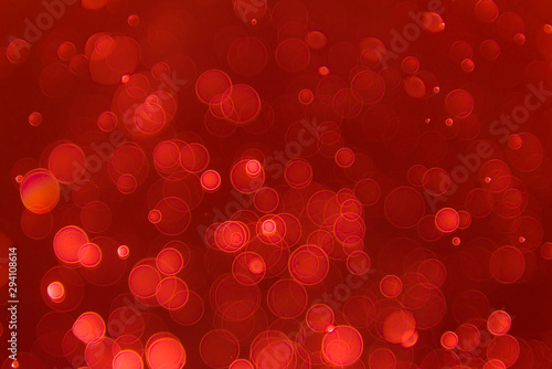 abstract sparkle bokeh light effect with red background, abstract bokeh background