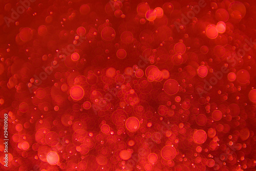 abstract sparkle bokeh light effect with red background, abstract bokeh background