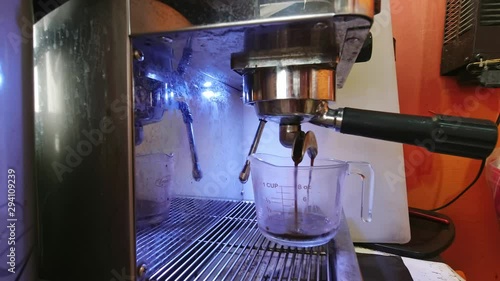 Makeing fresh coffee with coffee matchine. photo