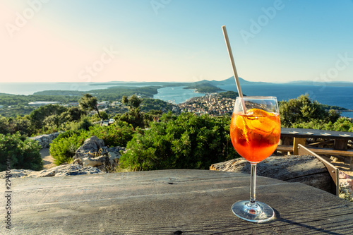 cocktail with scenic view of the croatian losinj islands in the kvarner gulf daytime photo