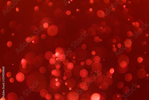 abstract sparkle bokeh light effect with red background, abstract bokeh background