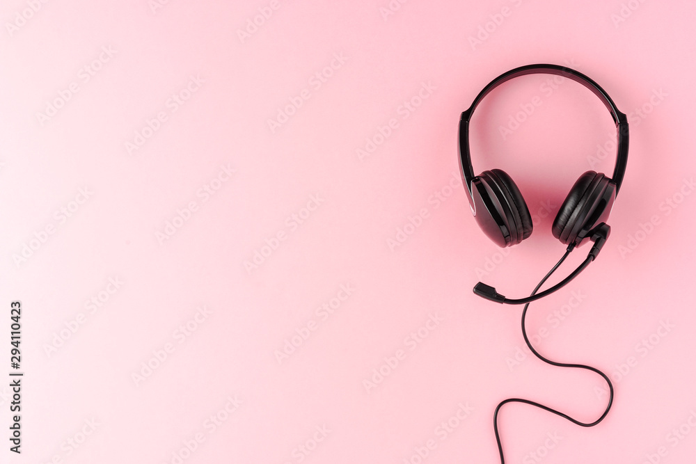 Overheadshot of headset on background with copyspace. Call center concept Overheadshot of headset on background with copyspace. Call center concept