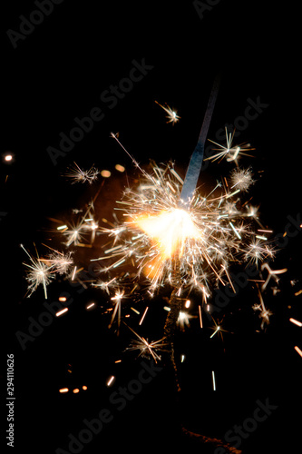 Hand-held fireworks burning and sparks