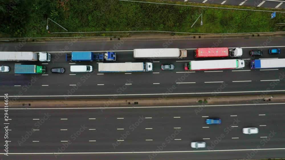 Flyover aerial heavy traffic backup jam on M1 highway expressway UK drone Flyover aerial heavy traffic backup jam on M1 highway expressway UK drone