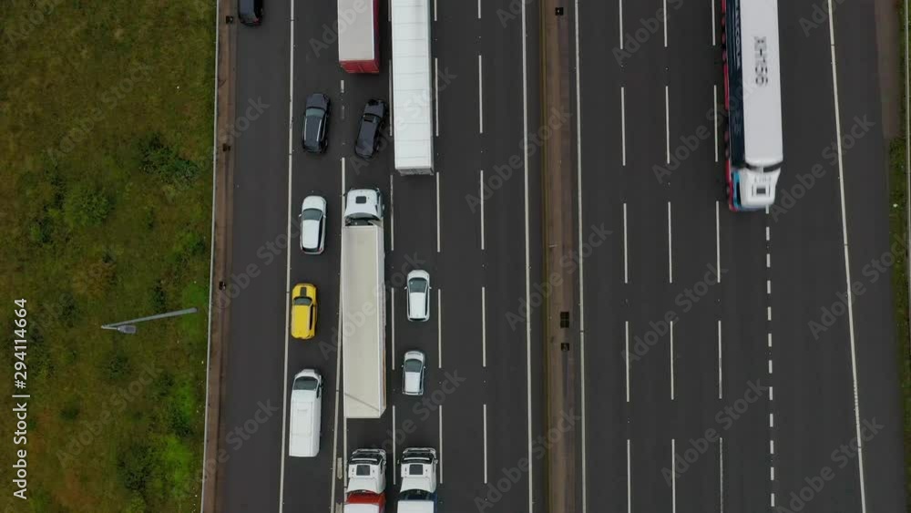 Overhead flyover traffic gridlock heavy back up on M1 expressway highway England UK climate change air pollution drone Overhead flyover traffic gridlock heavy back up on M1 expressway highway England UK climate change air pollution drone