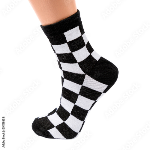 white and black socks in the cage and stripes or polka dot on a white isolated background